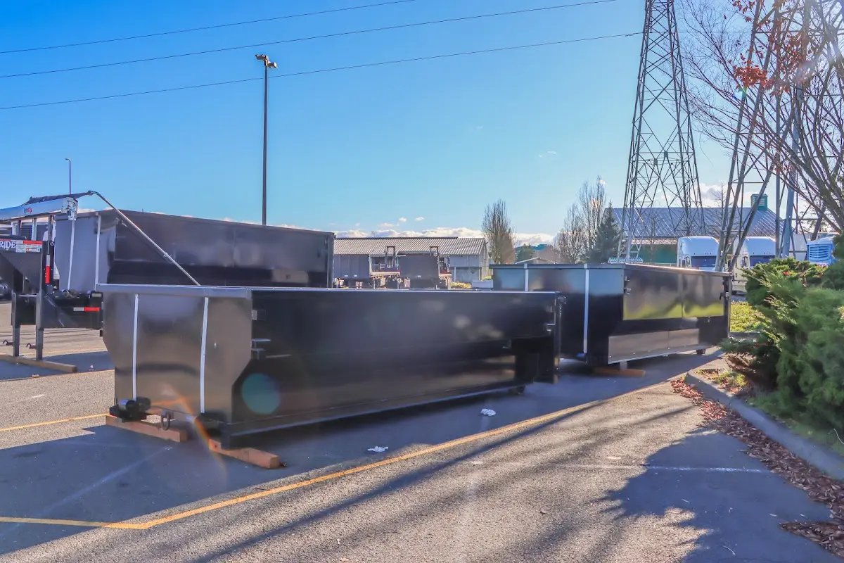 Roll-off dumpster ready for waste disposal at job site for Concrete Dumpster Rental in West Covina